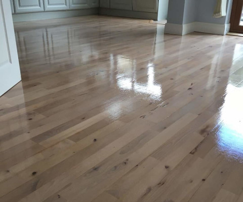 shinning wooden floors that have been freshly cleaned